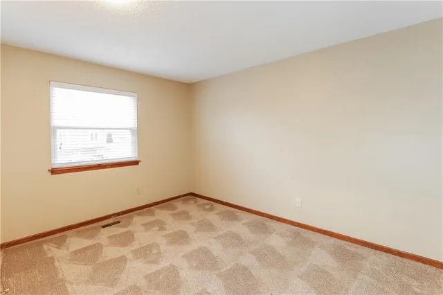 $1,835 | 14604 St Andrews Drive, Grandview, MO 64030