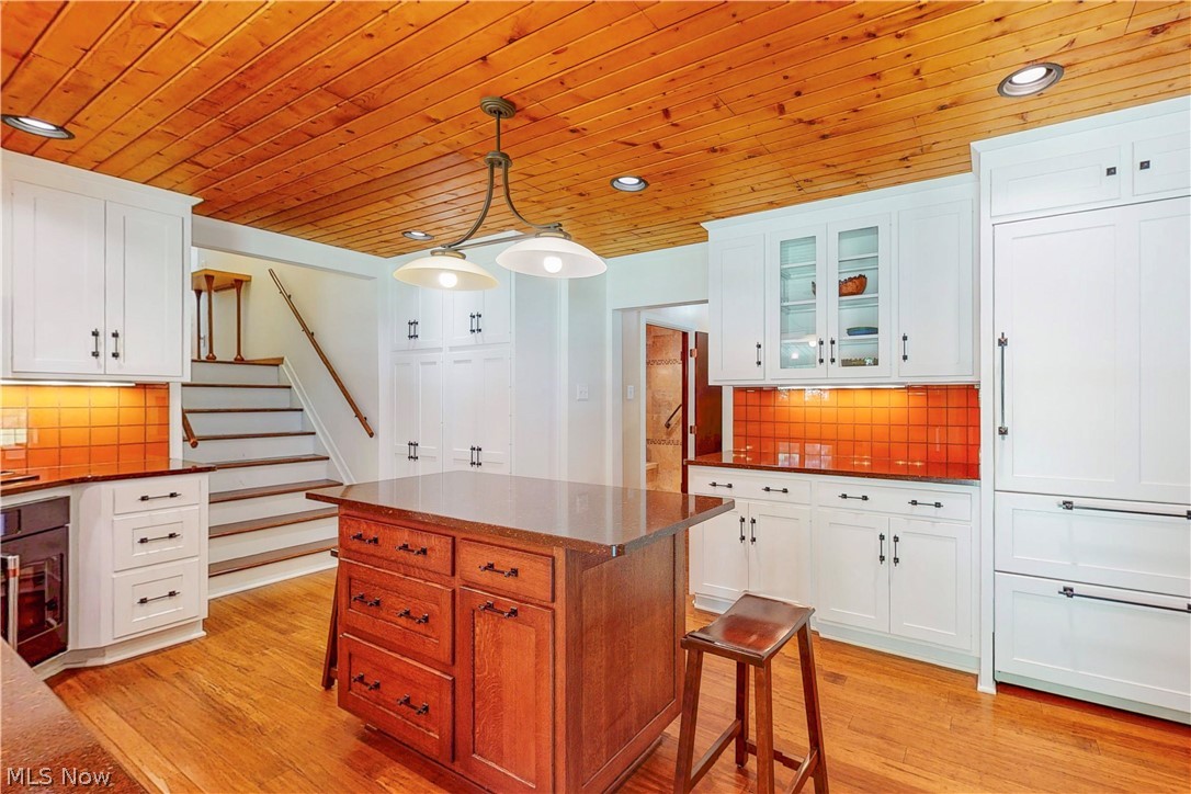 86532 North Bay Road Scio, OH 43988 - Photo 5 of 48 Kitchen with a wood-plank ceiling, recessed lighting, and a central island with a solid surface countertop