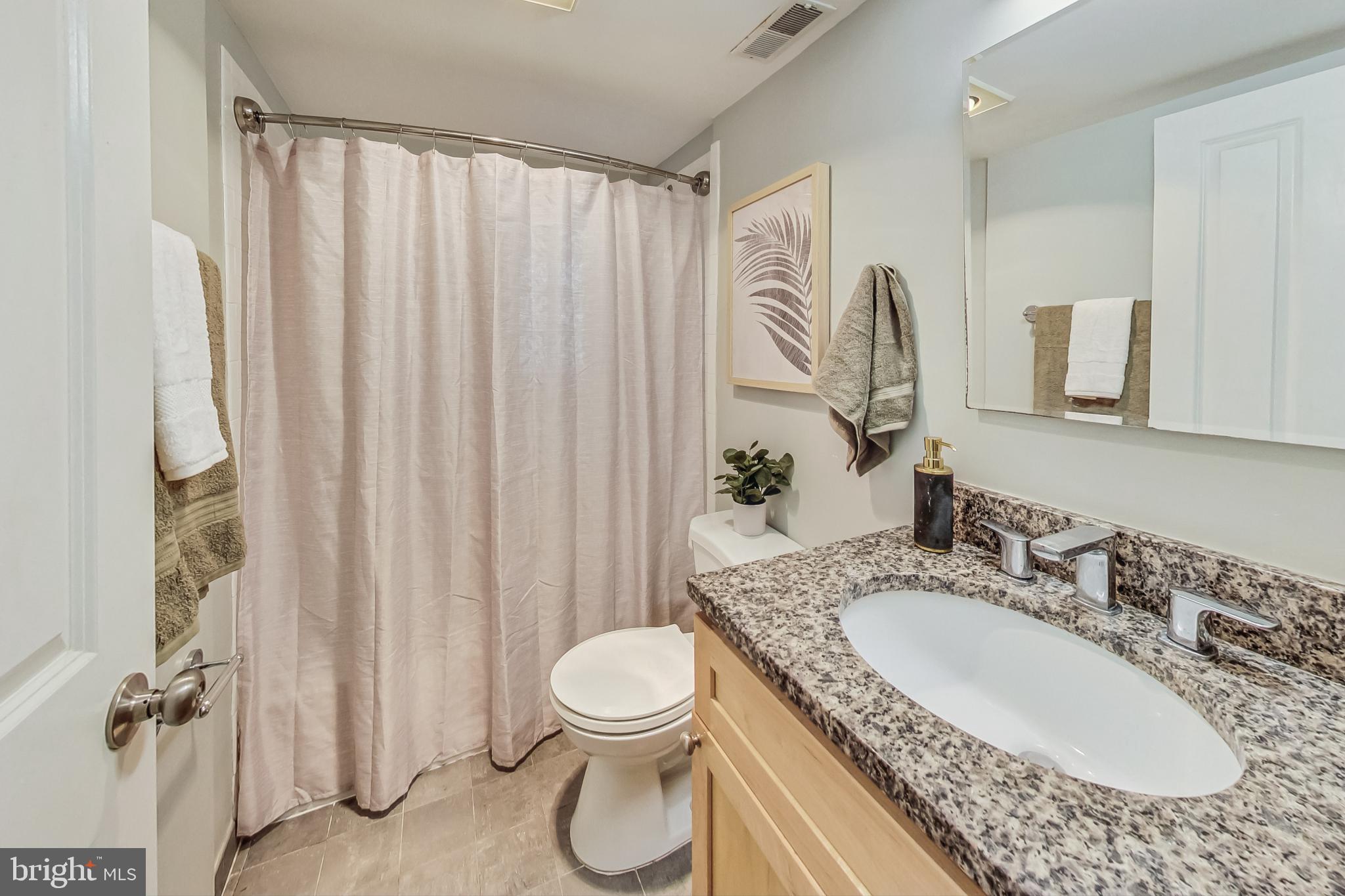 1701 16th Street Northwest, Unit 723 Washington, DC 20009 - Photo 14 of 52 Bathroom is convenient to bedroom and living