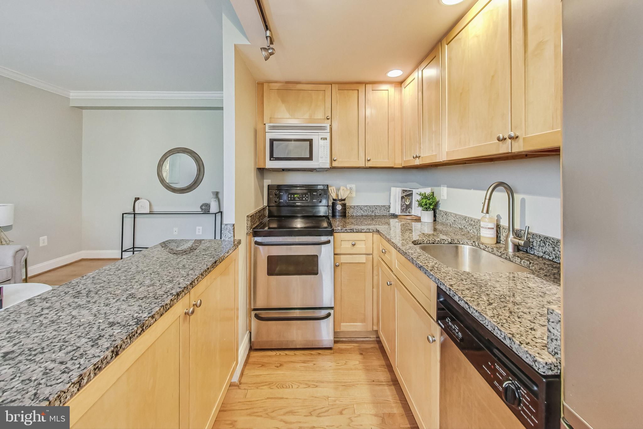 1701 16th Street Northwest, Unit 723 Washington, DC 20009 - Photo 10 of 52 Granite countertops and stainless appliances