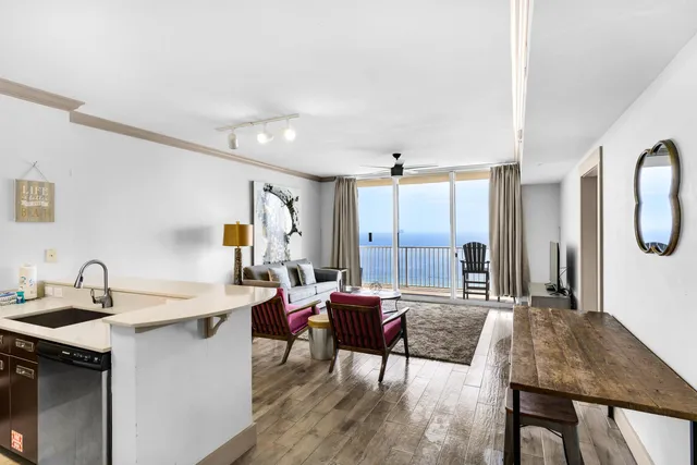 a very nice looking dining room with a table and chairs