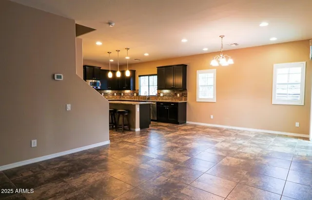 a view of a kitchen with a sink and a microwave