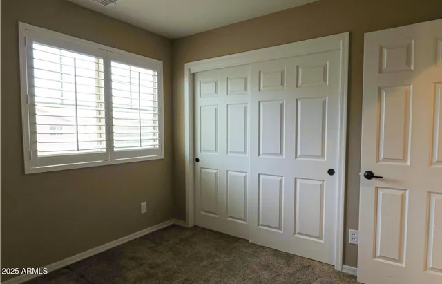 a view of cabinets and window