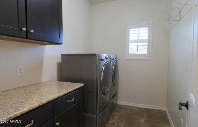 a view of a bathroom with a glass door and a window