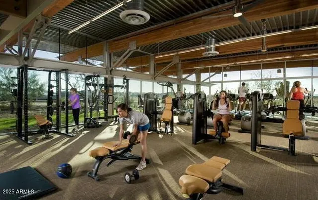 a view of a garden and basketball court