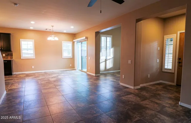 a view of livingroom with entryway and front door