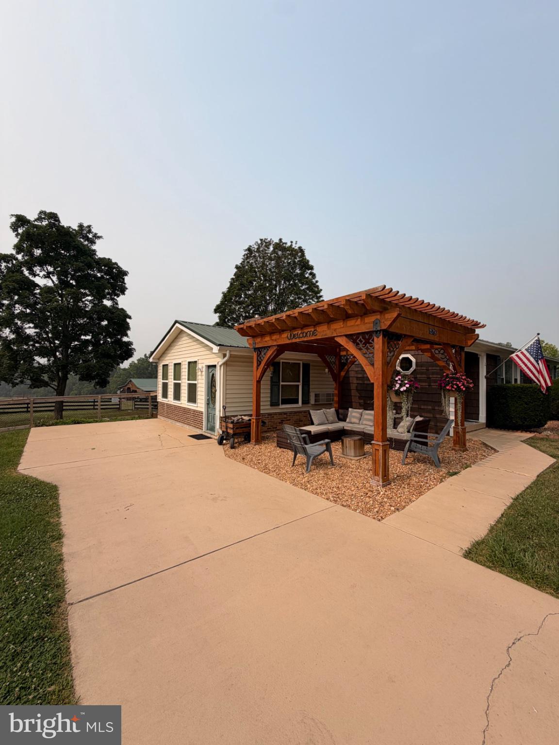 1579 Millner Road Strasburg, VA 22657 - Photo 1 of 18 Charming patio with rustic pergola.