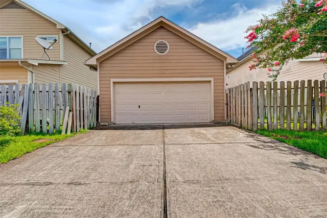 a house view with a garage