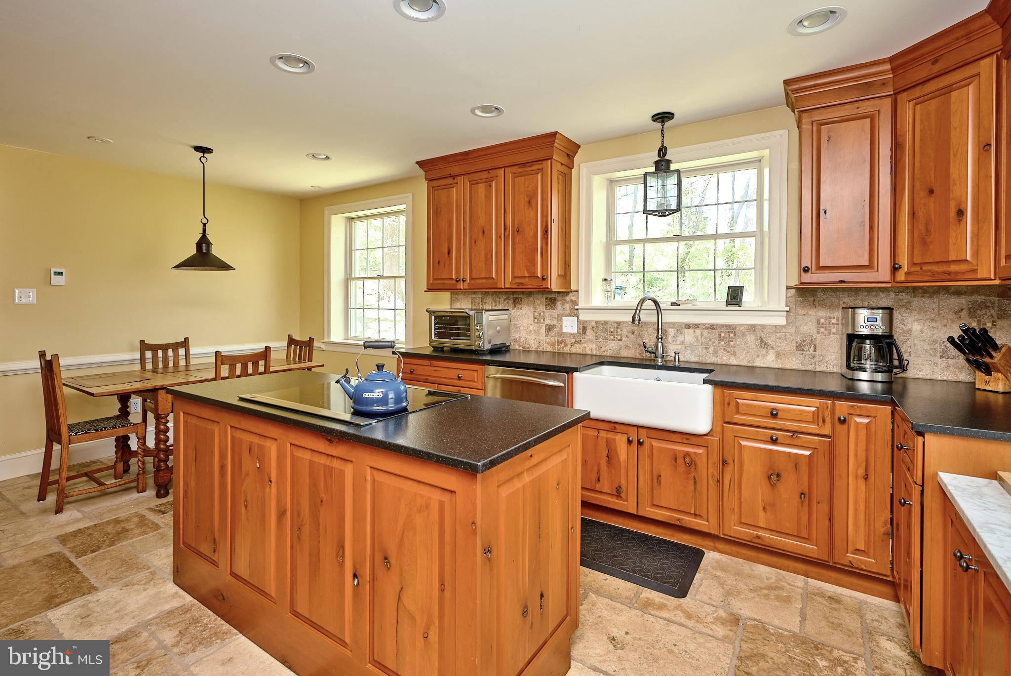 2981 Comfort Road New Hope, PA 18938 - Photo 13 of 33 a kitchen with stainless steel appliances granite countertop a sink a stove a counter space and cabinets