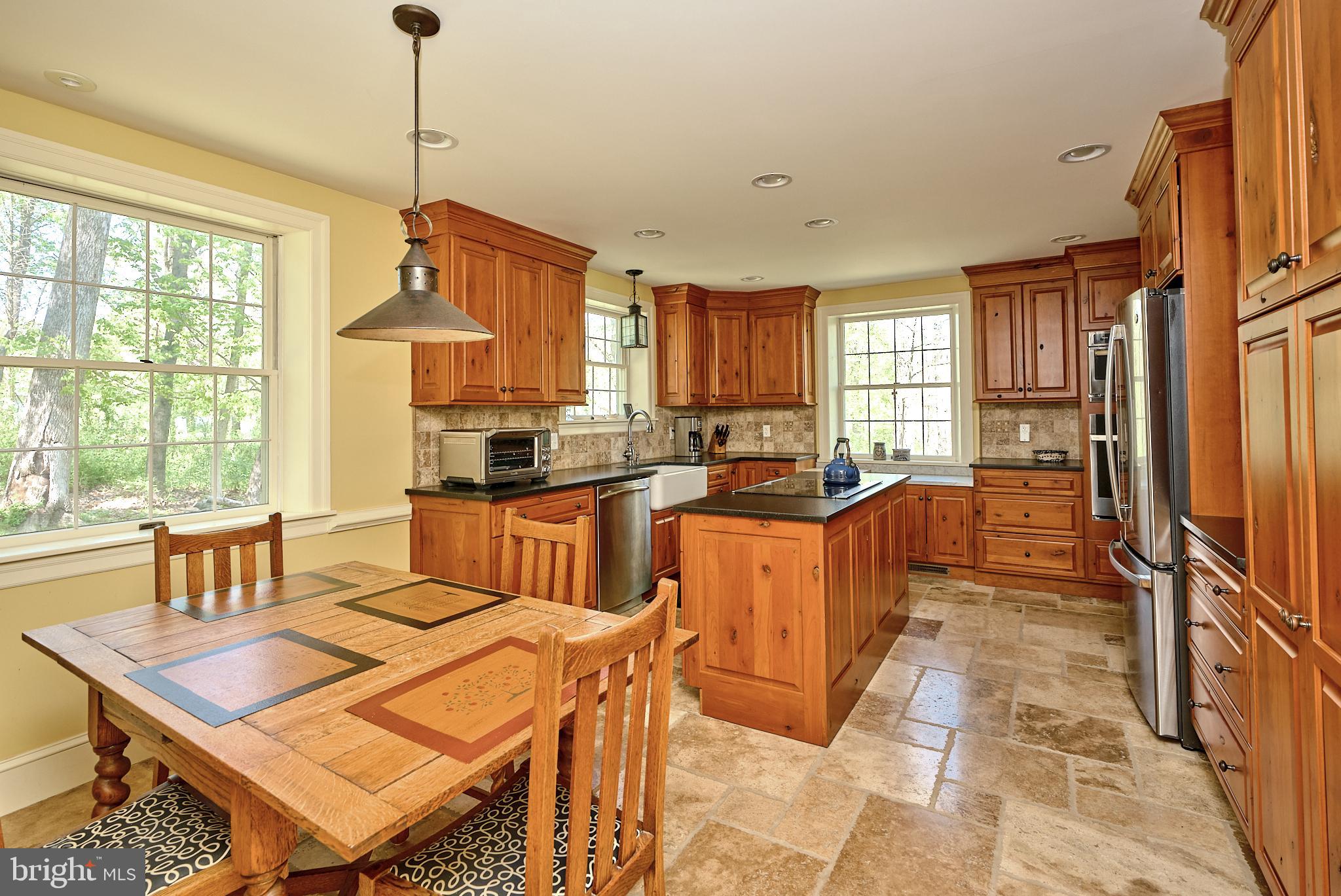 2981 Comfort Road New Hope, PA 18938 - Photo 14 of 33 a kitchen with stainless steel appliances granite countertop a sink a stove and a refrigerator