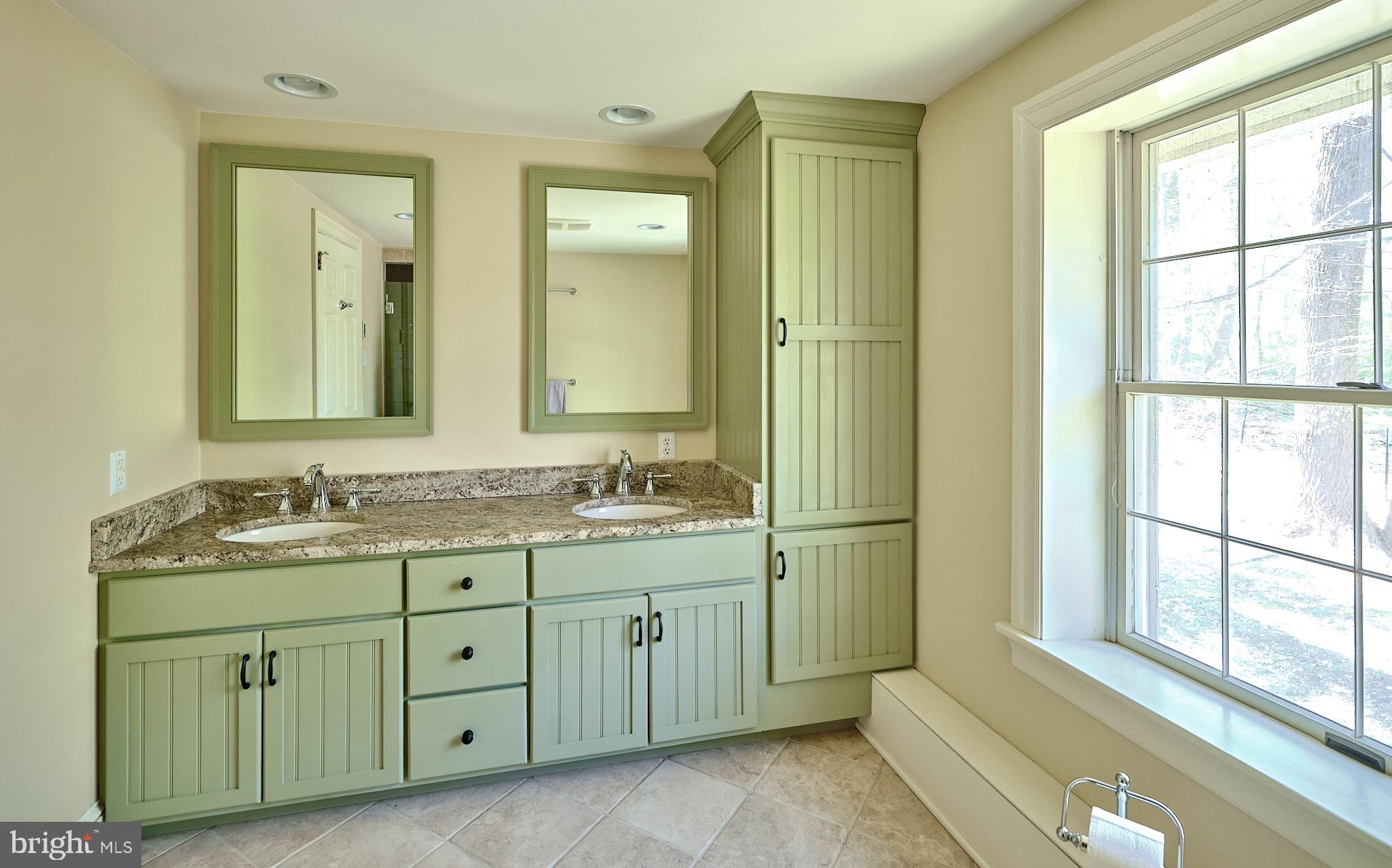 2981 Comfort Road New Hope, PA 18938 - Photo 19 of 33 a bathroom with a granite countertop sink mirror and a