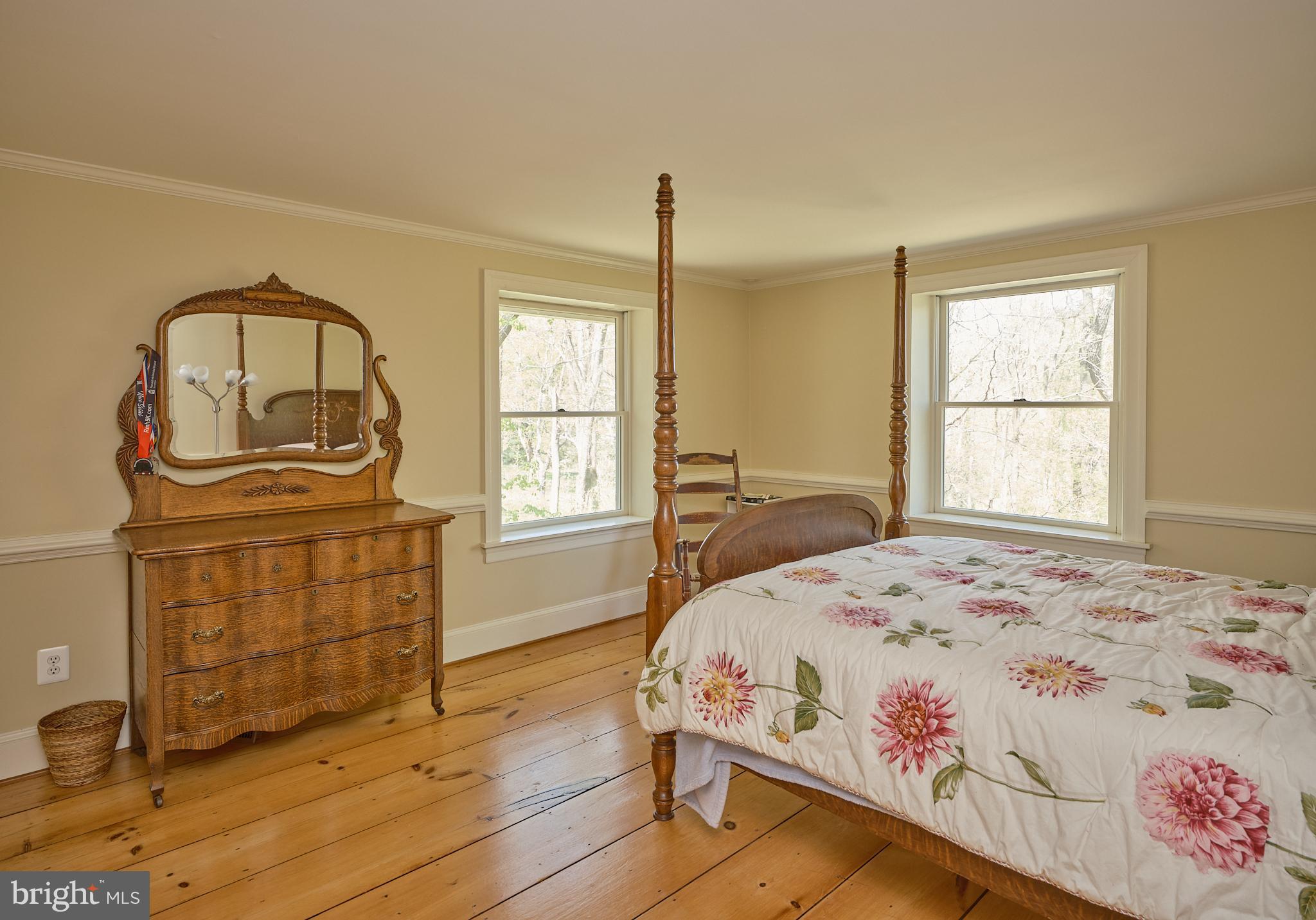 2981 Comfort Road New Hope, PA 18938 - Photo 23 of 33 a bedroom with a bed and wooden floor