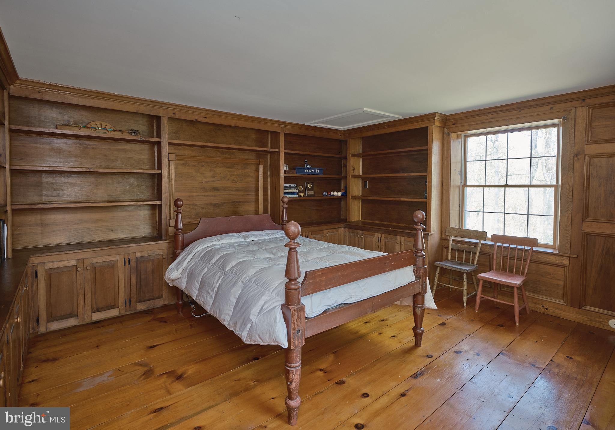 2981 Comfort Road New Hope, PA 18938 - Photo 24 of 33 a bedroom with a bed and a chair