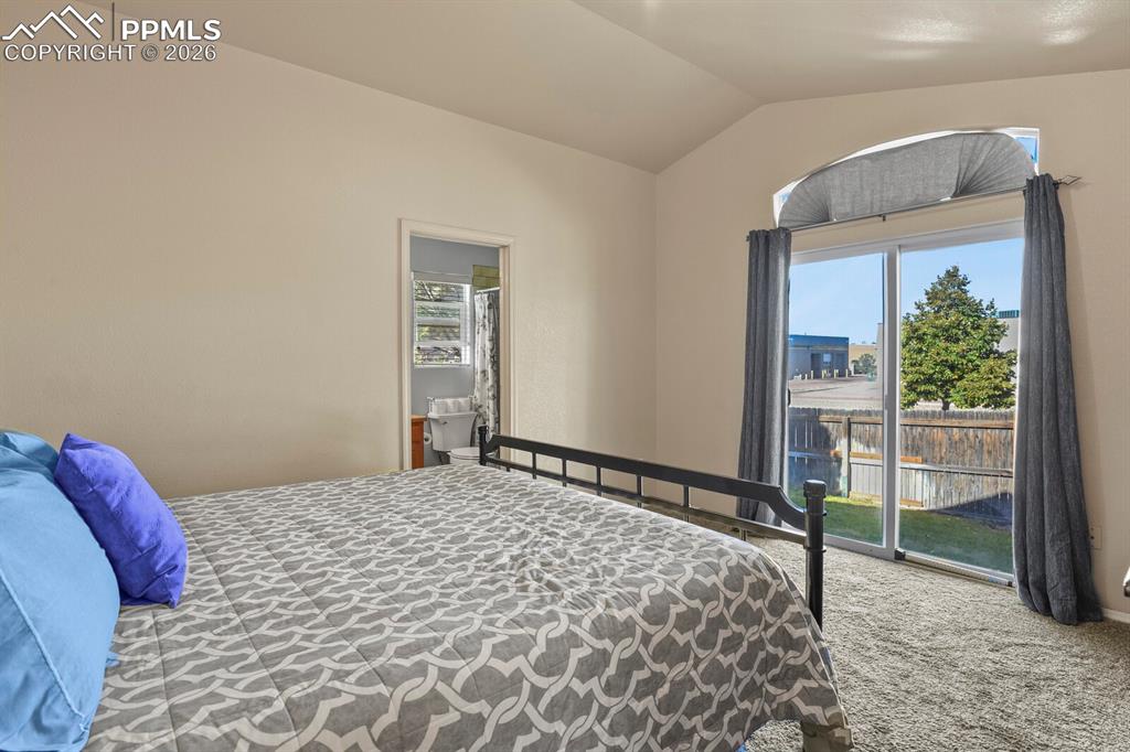 7394 Owings Point Peyton, CO 80831 - Photo 12 of 21 The primary bedroom has its own private bathroom and walk-in closet.