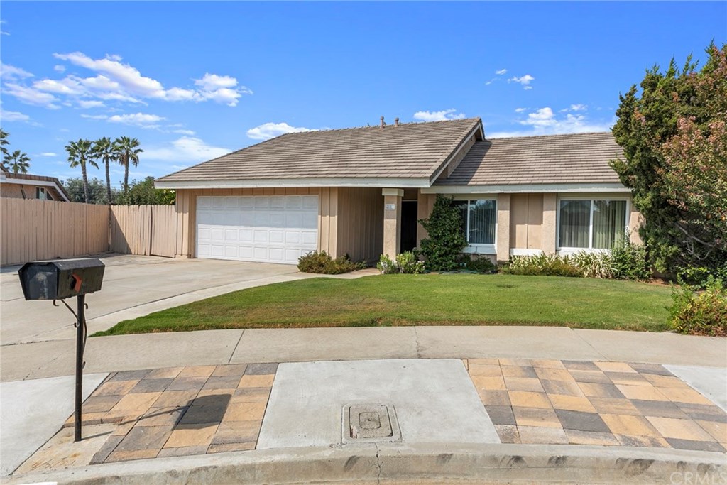 Front of this lovely home with a 5 year new roof and oversized driveway.
