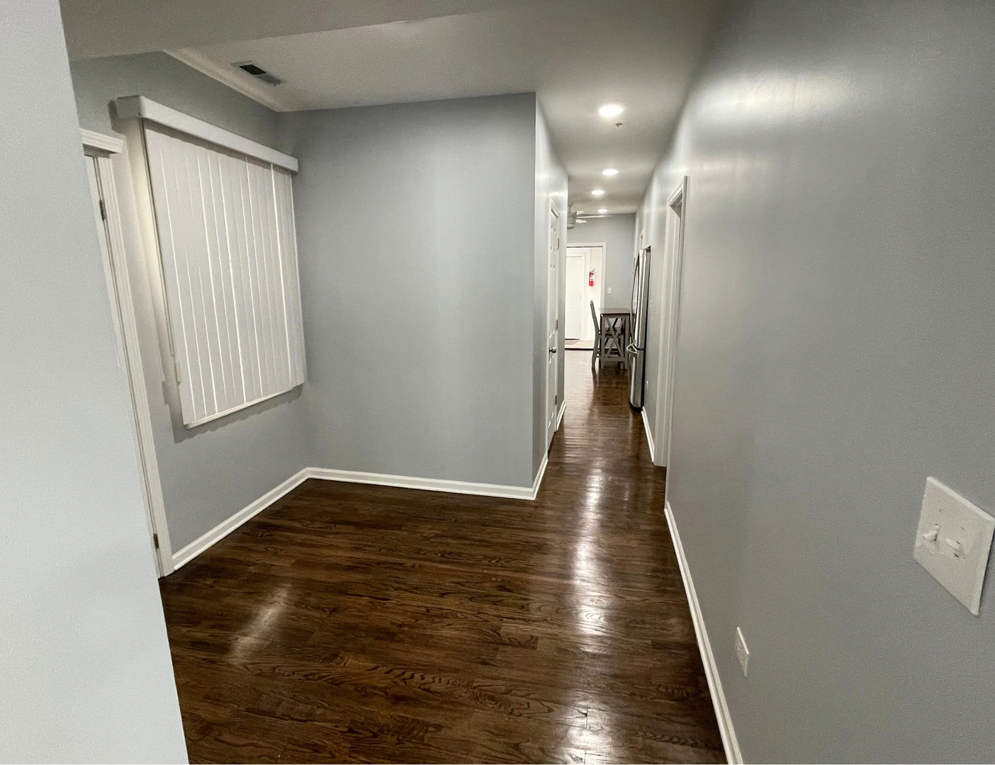 1836 South May Street, Unit 1 Chicago, IL 60608 - Photo 5 of 15 a view of hallway with wooden floor