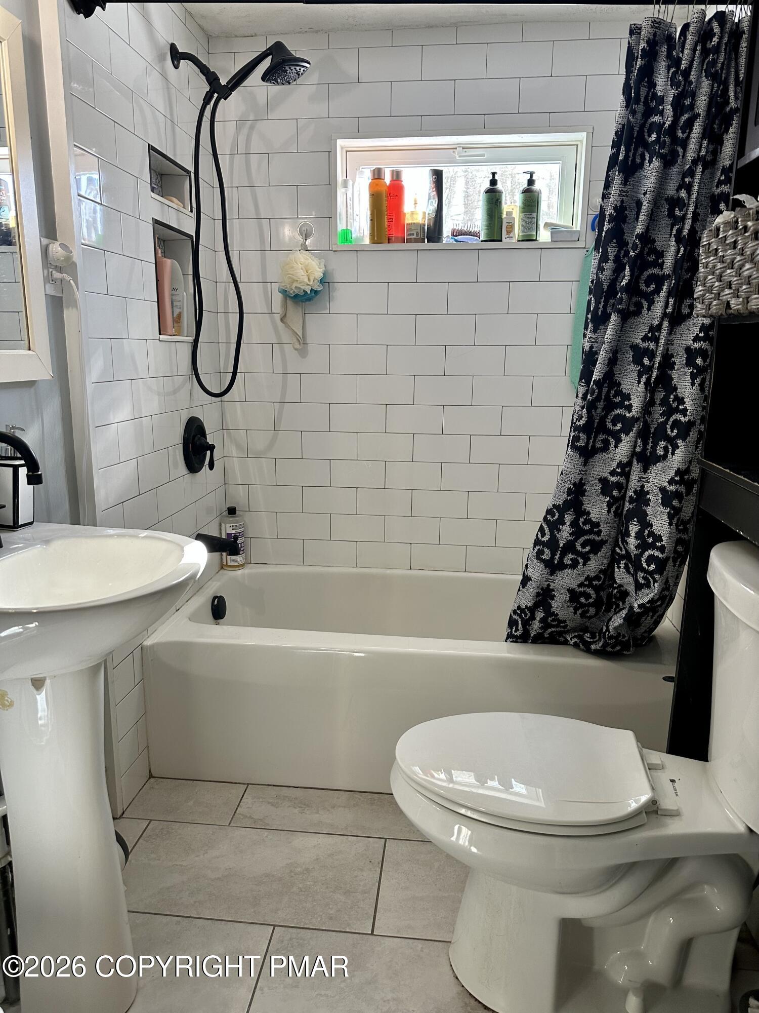 106 Independence Road East Stroudsburg, PA 18301 - Photo 18 of 30 a bathroom with a toilet and a shower