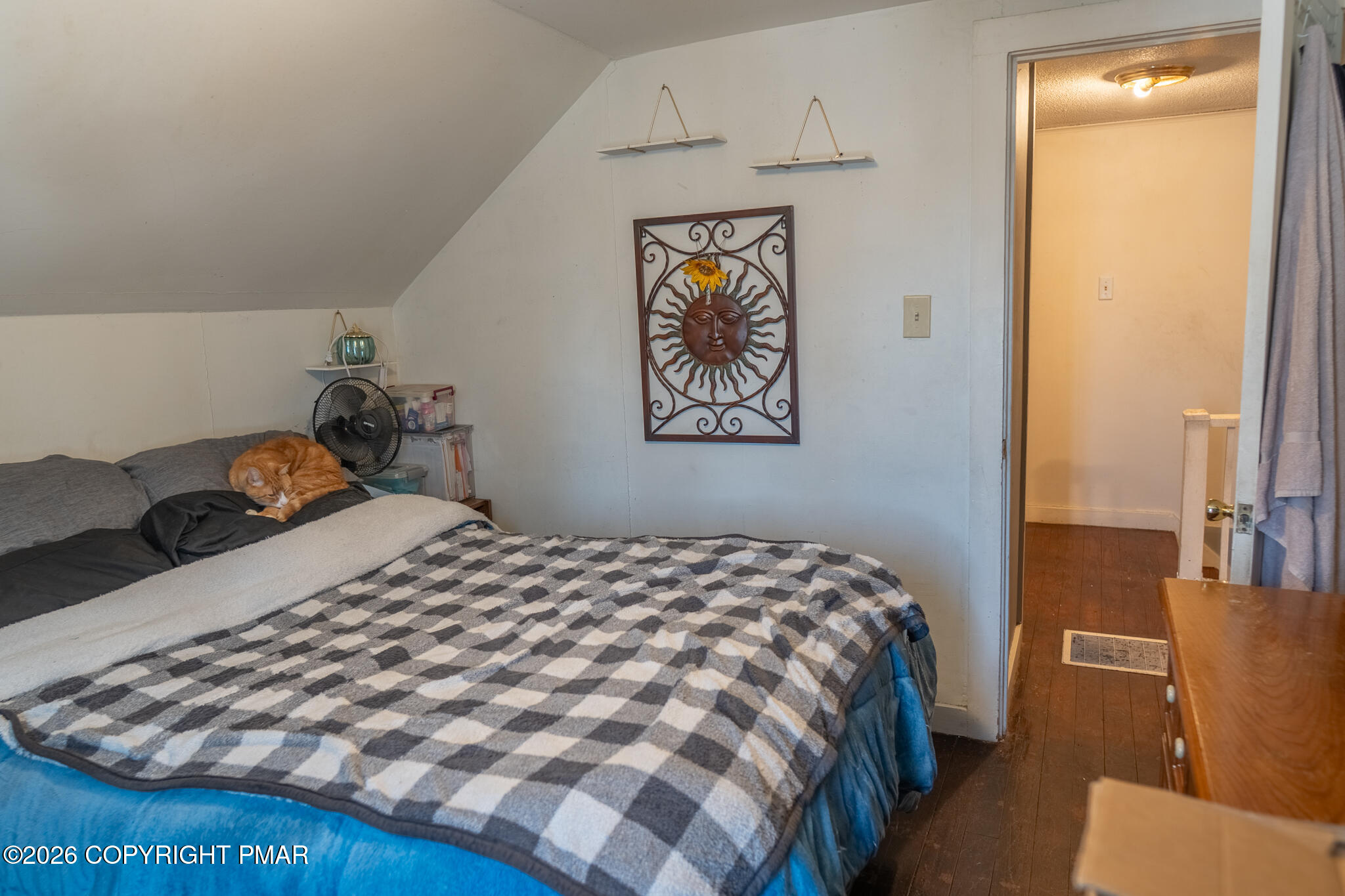 106 Independence Road East Stroudsburg, PA 18301 - Photo 23 of 30 a bedroom with a bed and wooden floor
