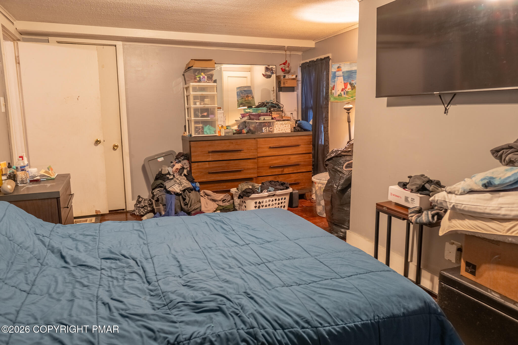 106 Independence Road East Stroudsburg, PA 18301 - Photo 25 of 30 a bedroom with a bed and wooden floor
