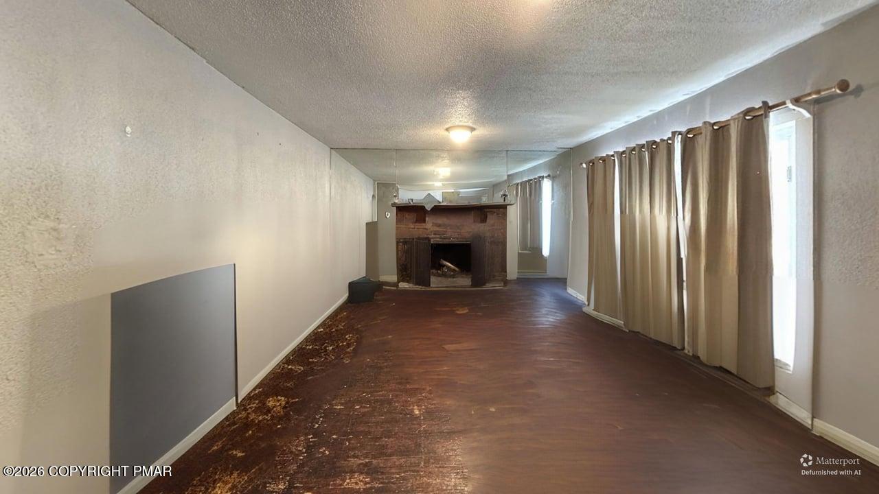 106 Independence Road East Stroudsburg, PA 18301 - Photo 28 of 30 a view of a livingroom with a fireplace