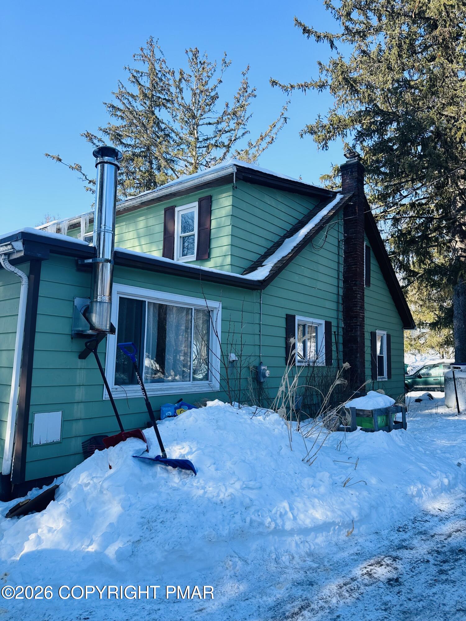 106 Independence Road East Stroudsburg, PA 18301 - Photo 5 of 30 a view of a house with a yard potted plants and a large tree