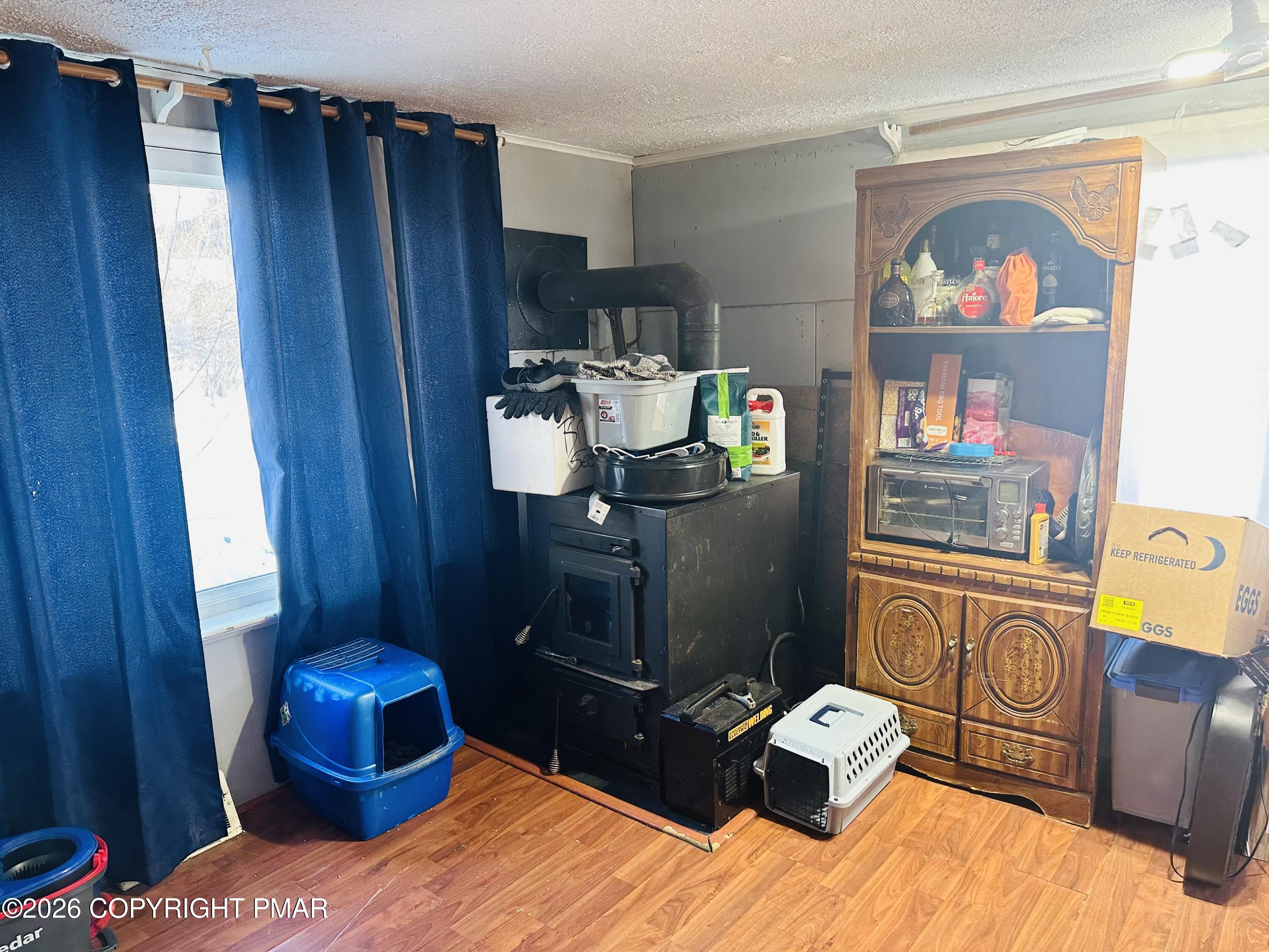 106 Independence Road East Stroudsburg, PA 18301 - Photo 8 of 30 a bedroom with a bed and wooden floor