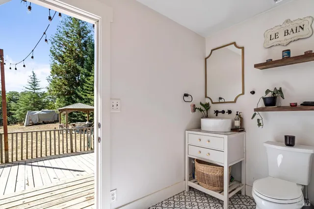 a bathroom with a sink toilet and a bathtub