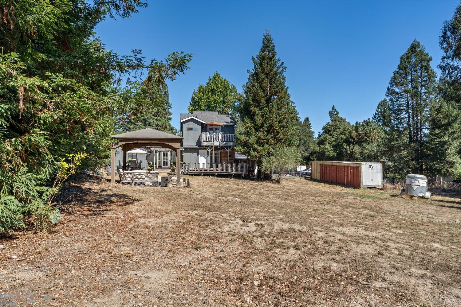 8061 Elphick Road Sebastopol, CA 95472 - Photo 24 of 40 a front view of a house with a garden