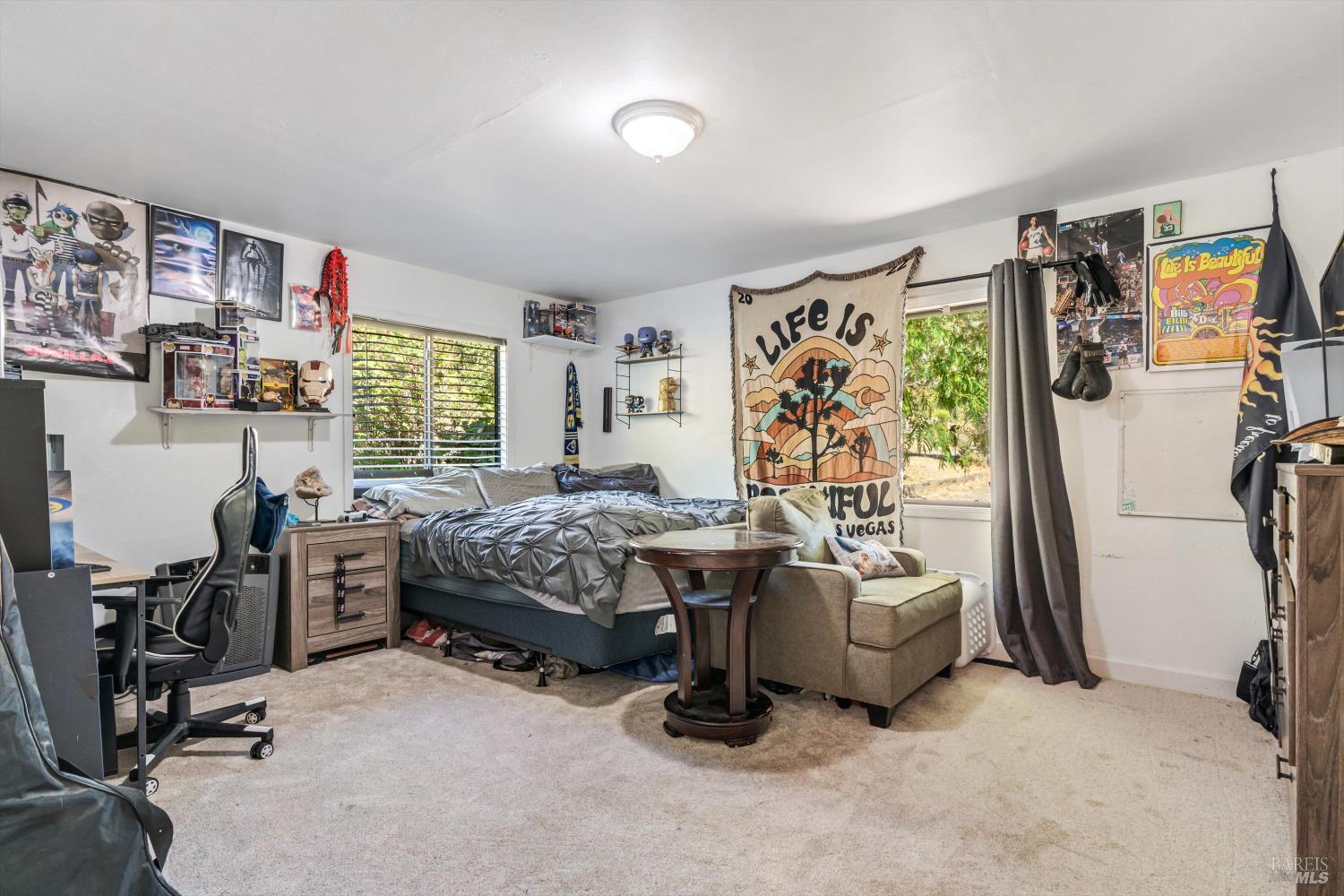 8061 Elphick Road Sebastopol, CA 95472 - Photo 30 of 40 a bedroom with bed and a large window