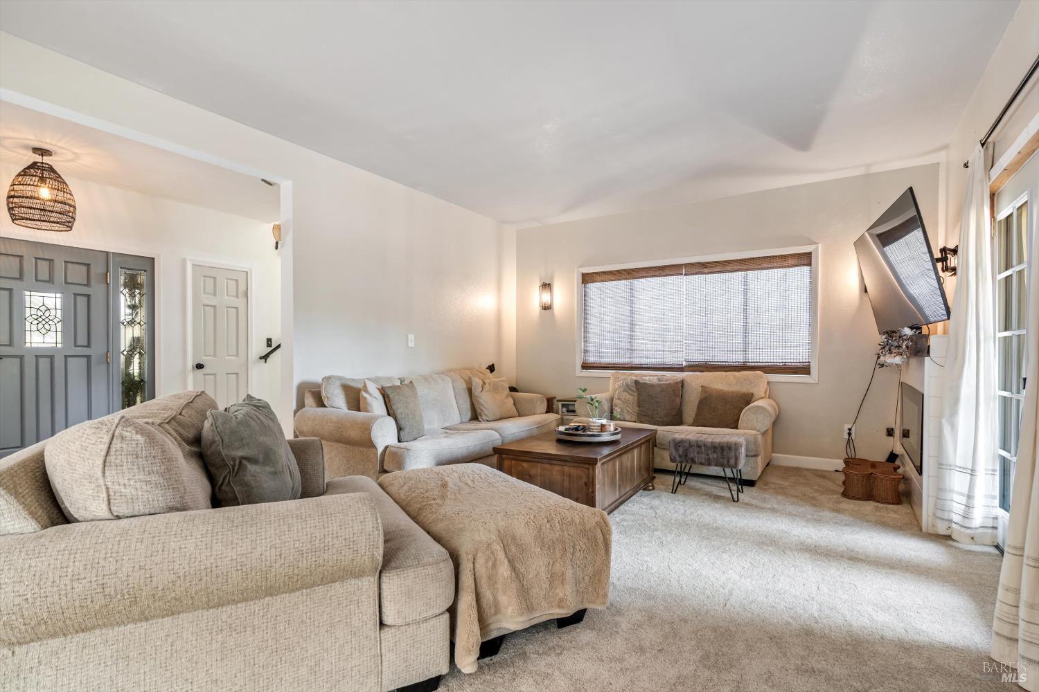 8061 Elphick Road Sebastopol, CA 95472 - Photo 6 of 40 a living room with furniture and a large window