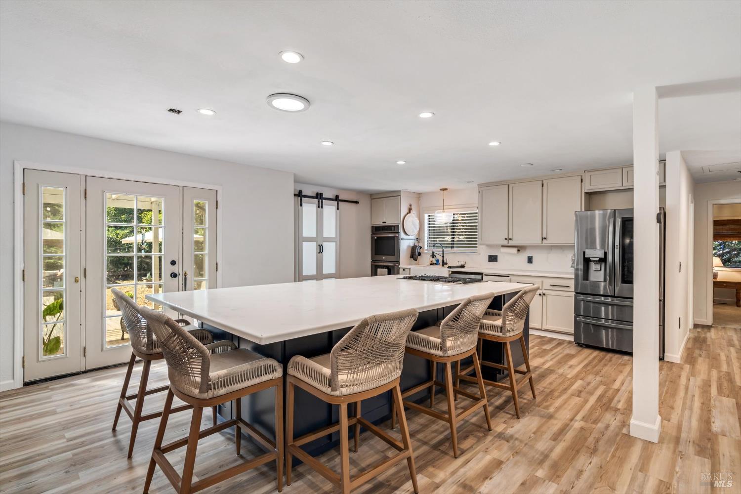 8061 Elphick Road Sebastopol, CA 95472 - Photo 8 of 40 a dining room with furniture and wooden floor