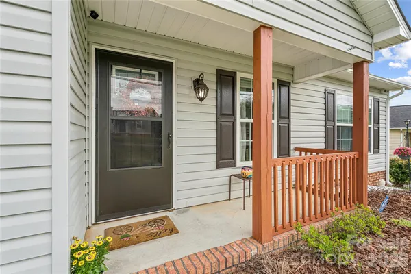 a front view of a house with a porch