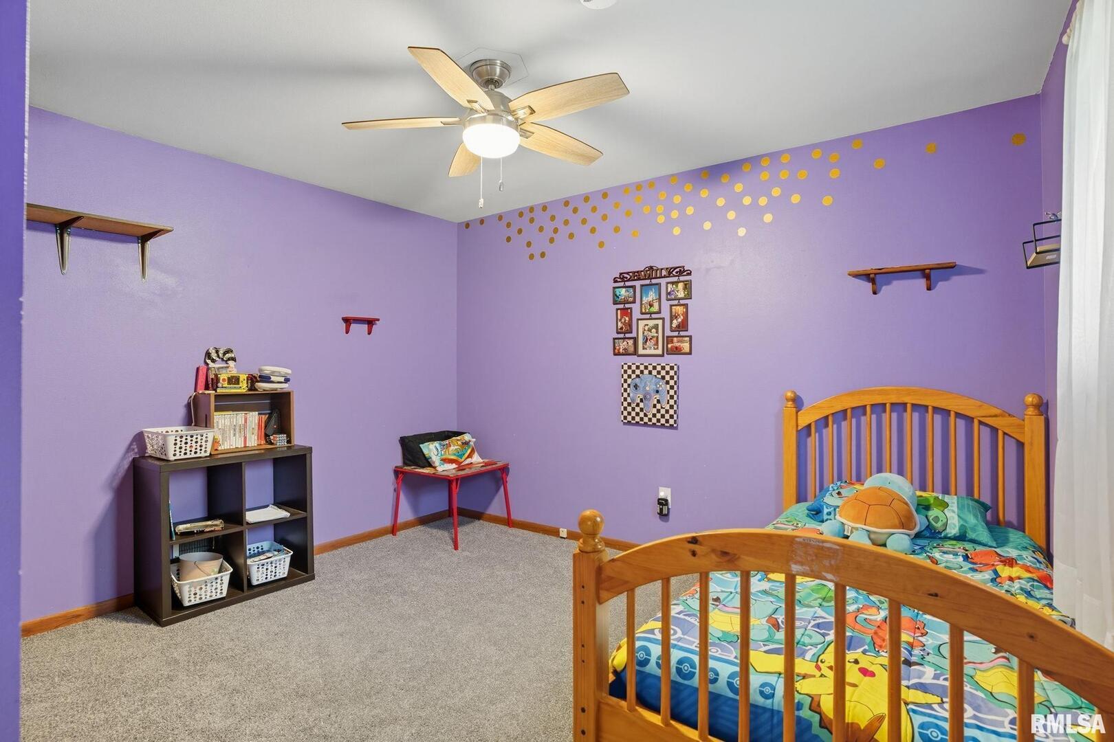 8039 Hazel Road Morrison, IL 61270 - Photo 18 of 39 a view of a bedroom with furniture and toys