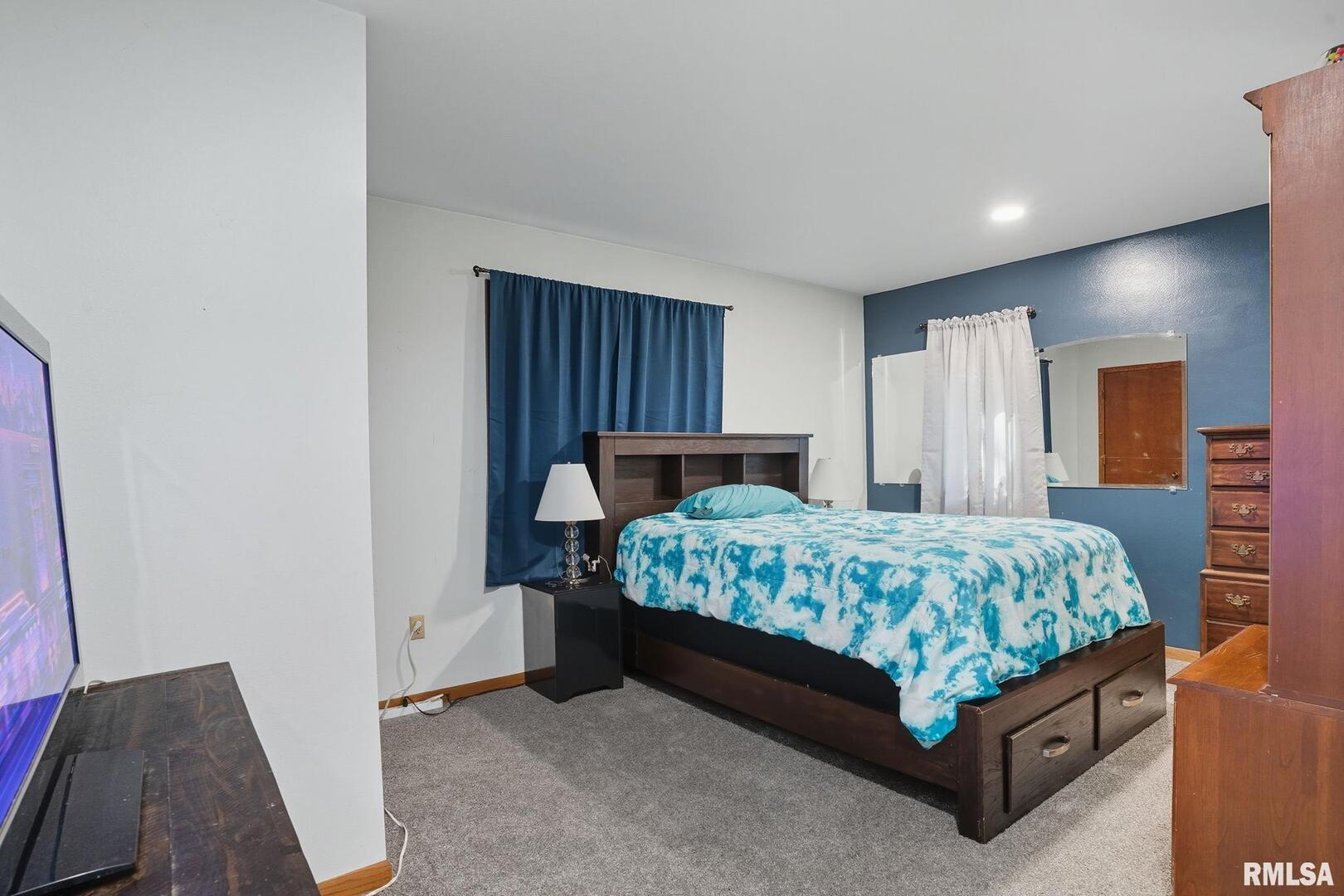 8039 Hazel Road Morrison, IL 61270 - Photo 20 of 39 a bedroom with a bed and window