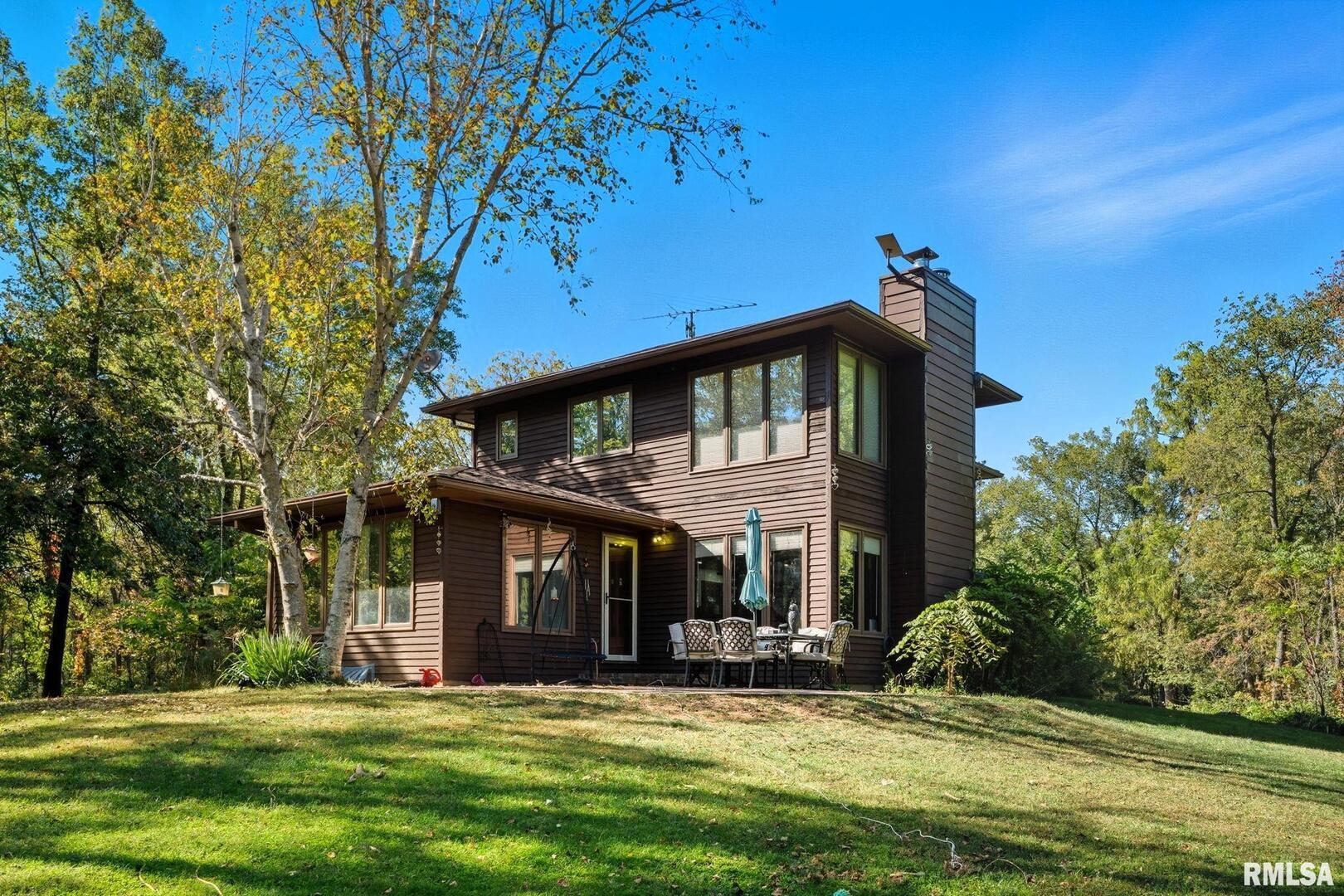 8039 Hazel Road Morrison, IL 61270 - Photo 29 of 39 a view of a house with a yard