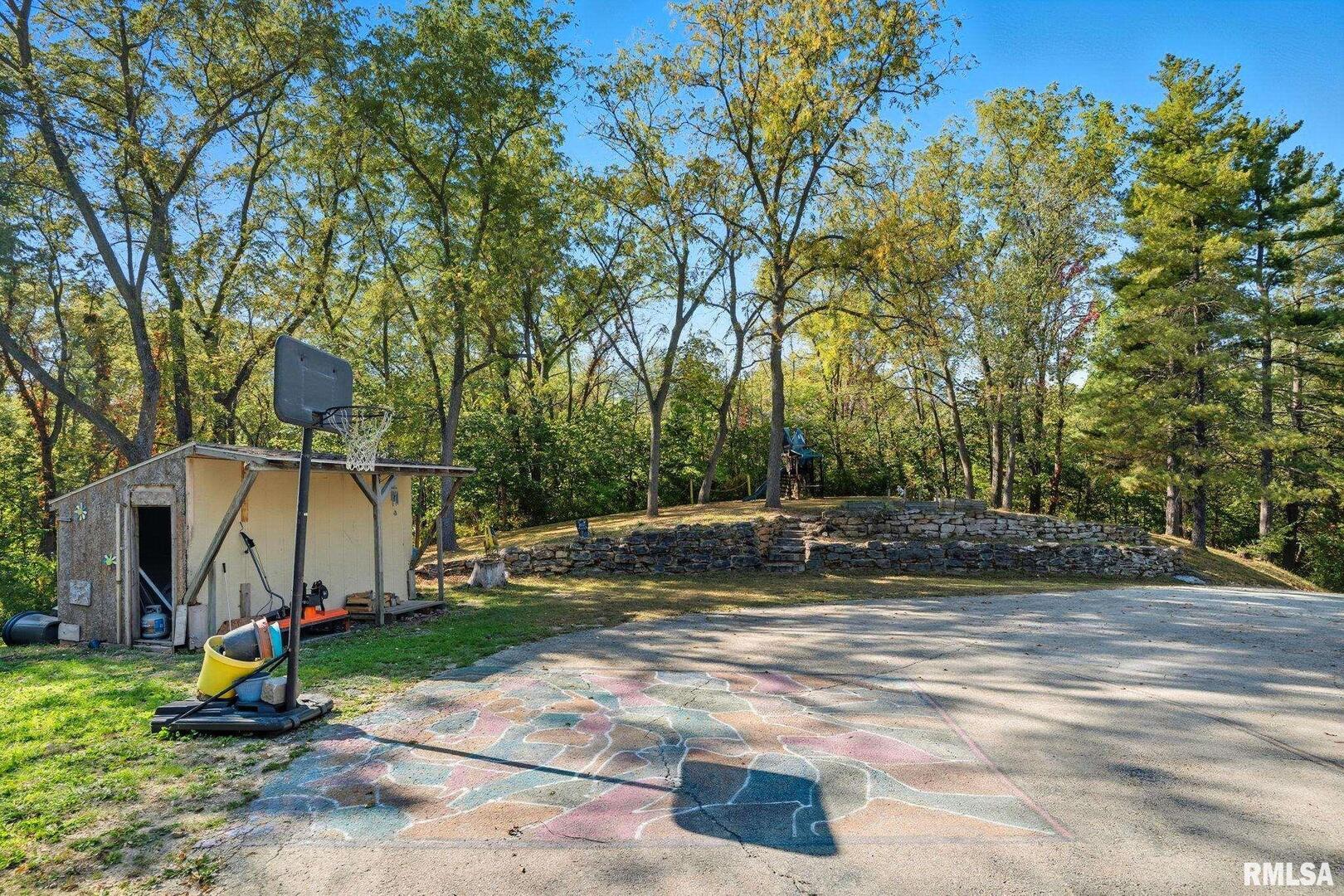 8039 Hazel Road Morrison, IL 61270 - Photo 31 of 39 a view of a park with swings