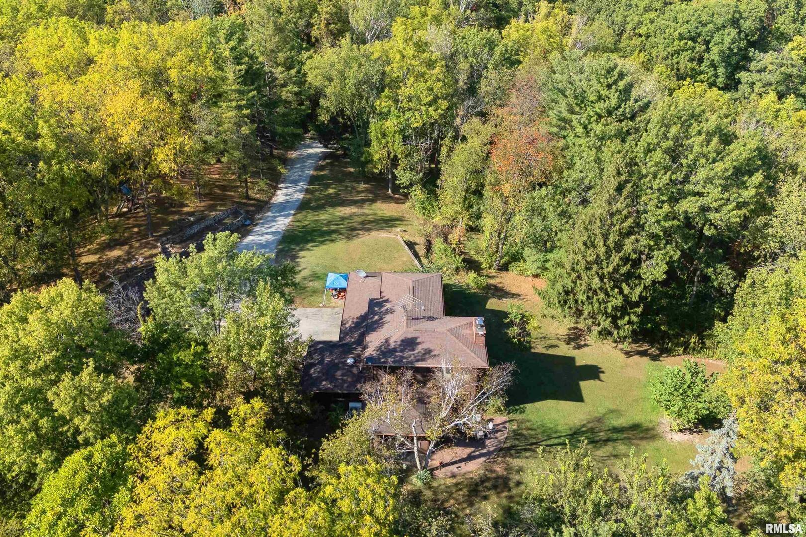 8039 Hazel Road Morrison, IL 61270 - Photo 34 of 39 an aerial view of a house with a yard