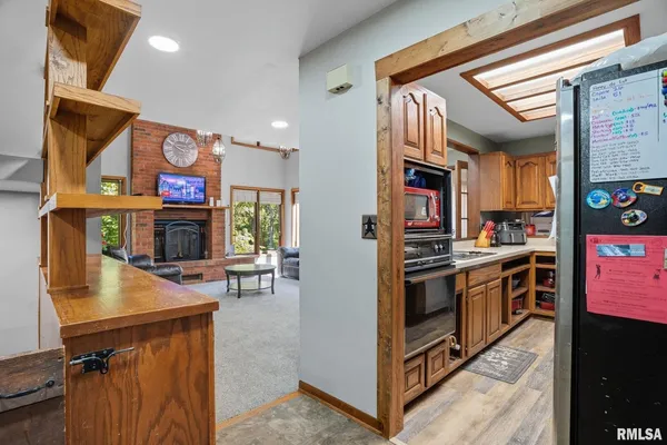 a kitchen with stainless steel appliances granite countertop a stove and a sink
