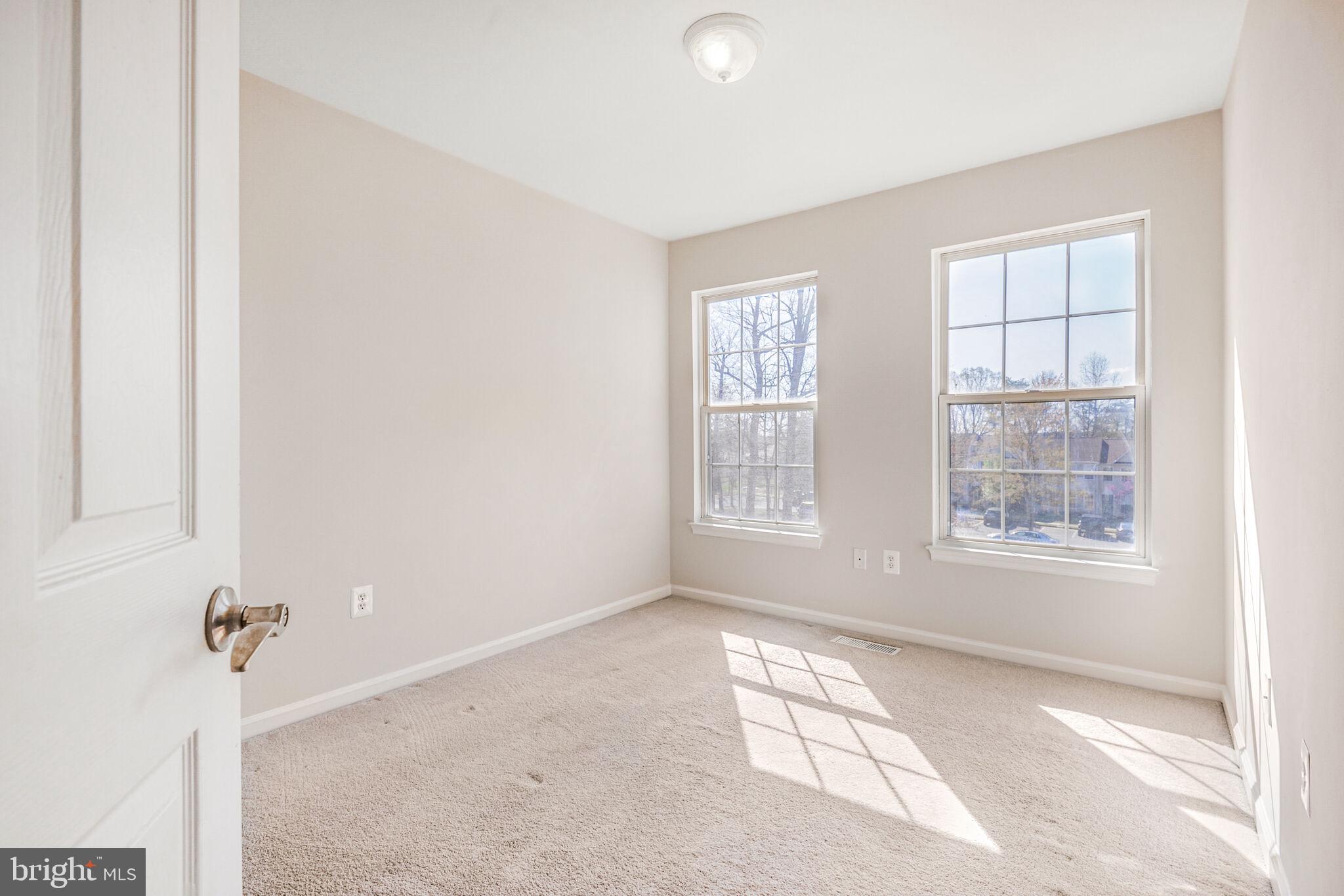 14812 Edman Circle Centreville, VA 20121 - Photo 12 of 24 a view of an empty room with a window