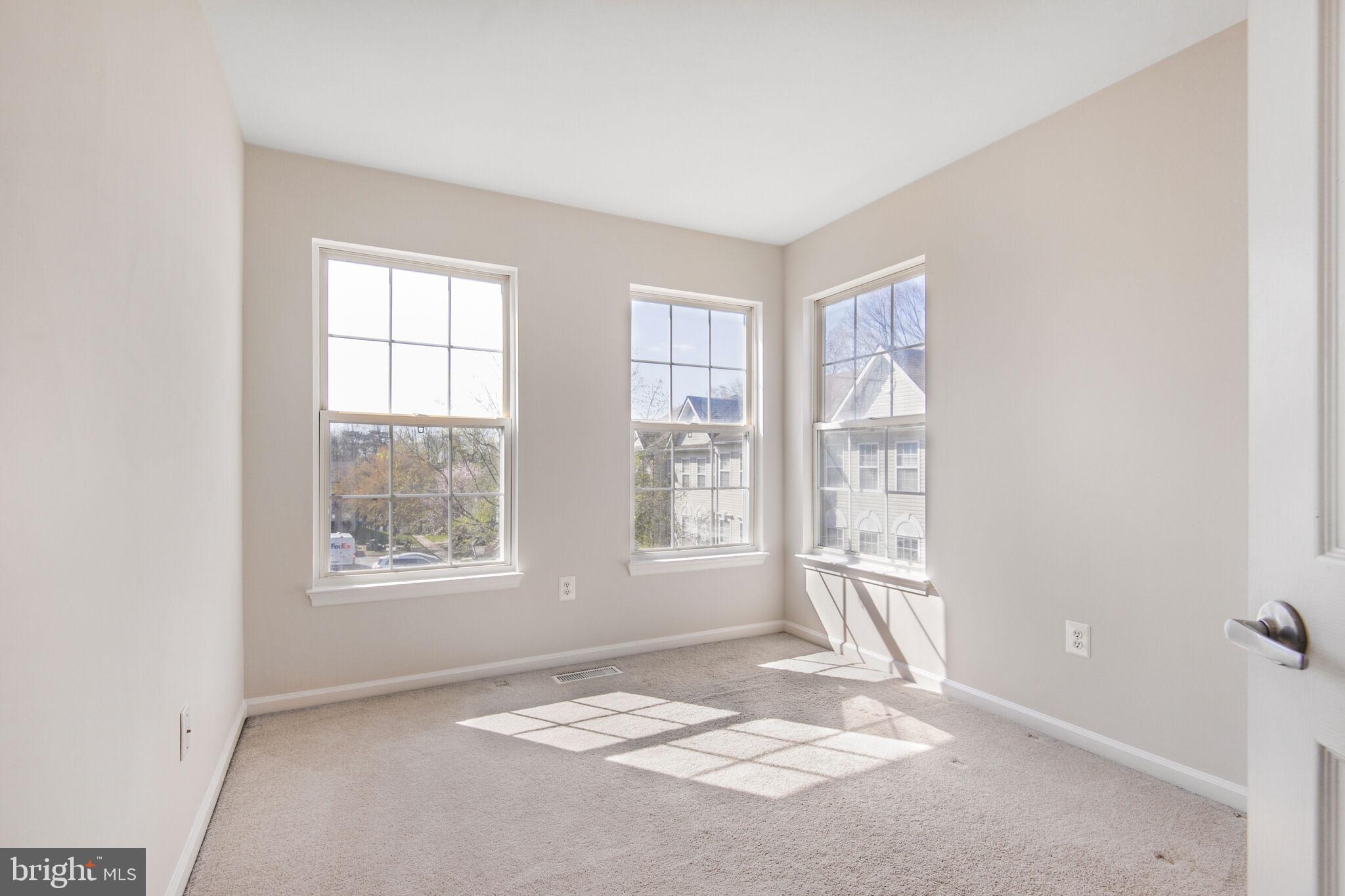 14812 Edman Circle Centreville, VA 20121 - Photo 13 of 24 a view of an empty room with a window