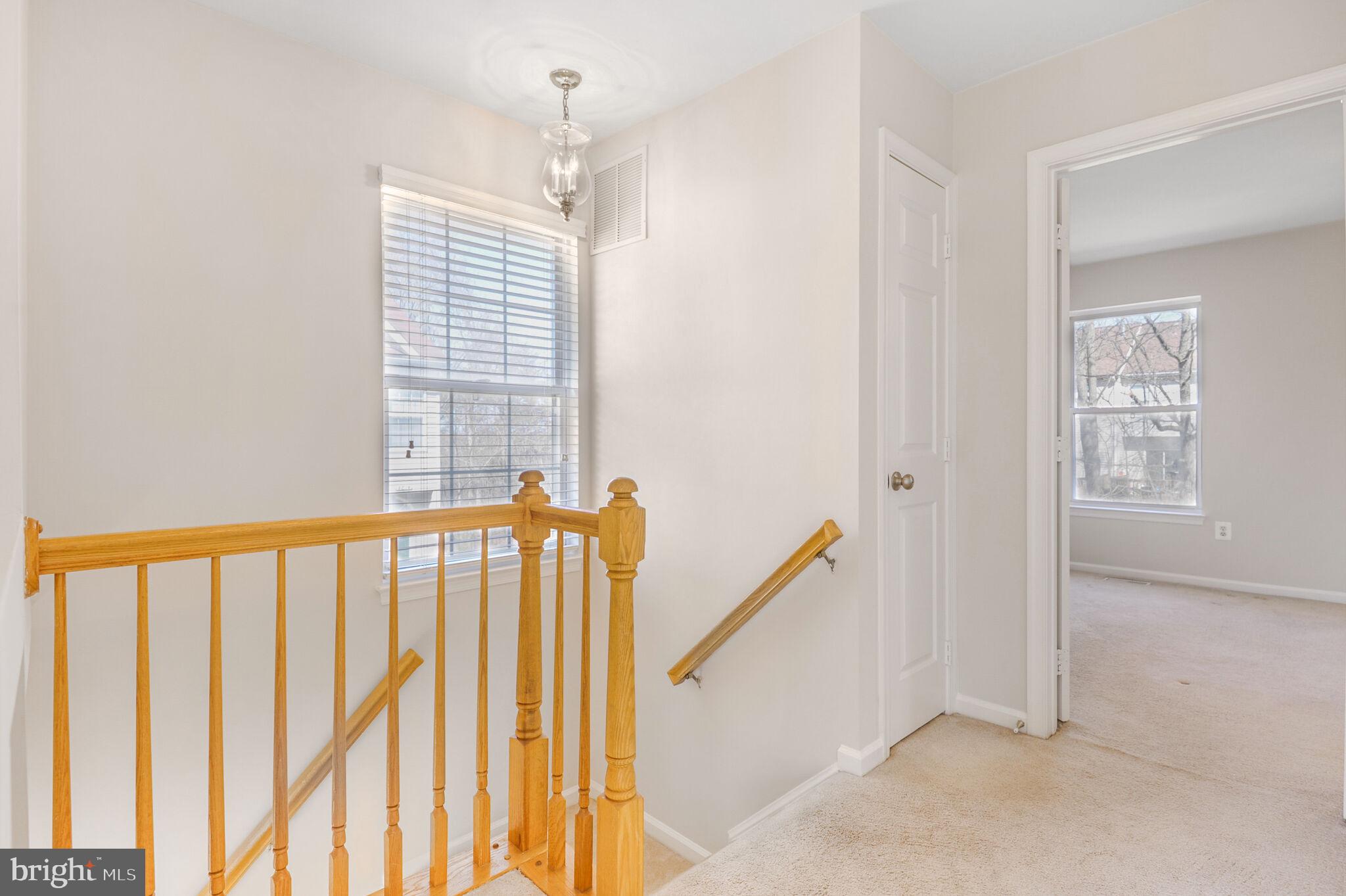 14812 Edman Circle Centreville, VA 20121 - Photo 14 of 24 a view of a porch with wooden floor