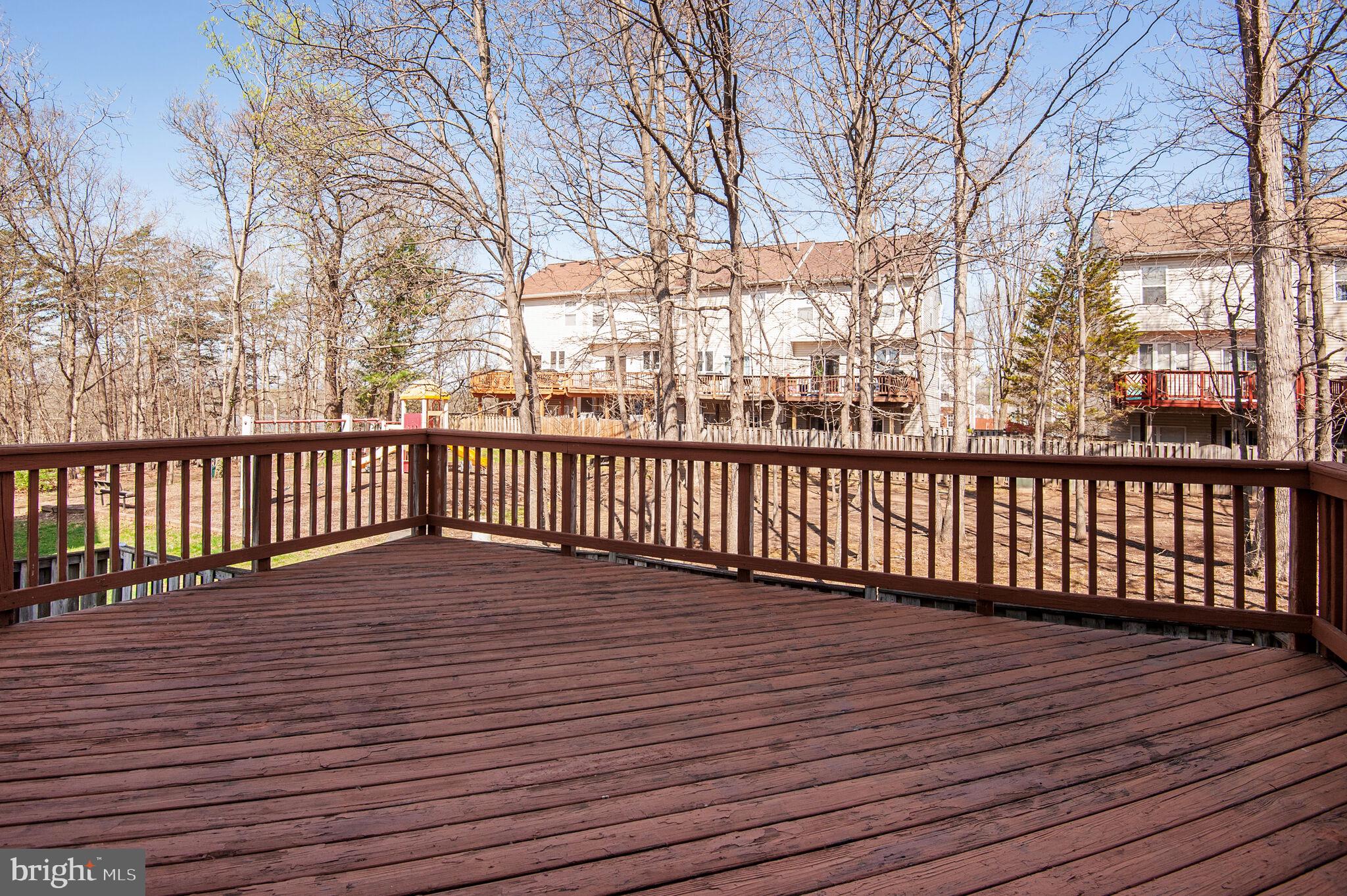 14812 Edman Circle Centreville, VA 20121 - Photo 20 of 24 a view of a wooden deck