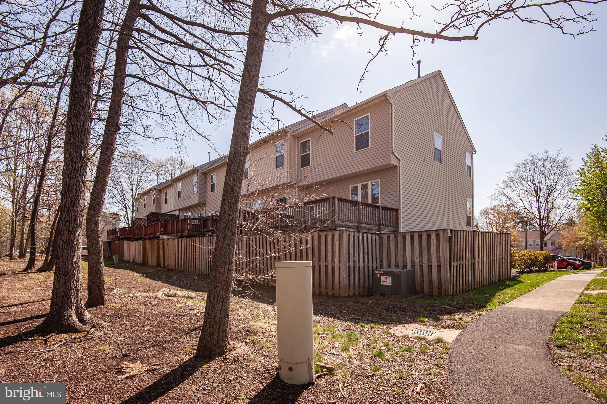 14812 Edman Circle Centreville, VA 20121 - Photo 22 of 24 a view of a house with a tree in the background
