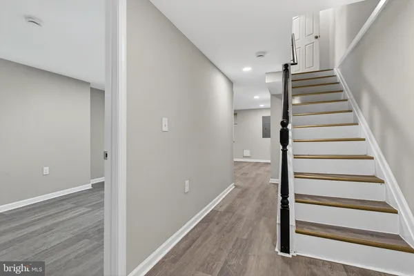 a view of entryway with wooden floor