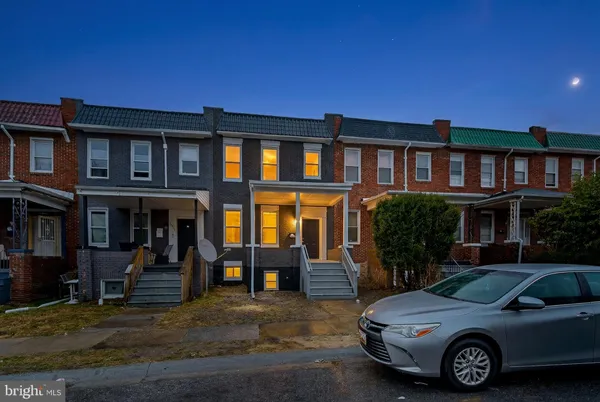 a car parked in front of a house
