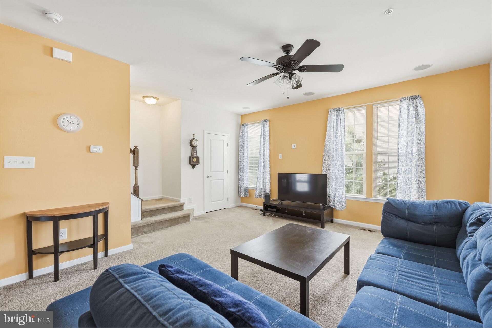 325 Schmidt Road Phoenixville, PA 19460 - Photo 12 of 27 a living room with furniture and a flat screen tv