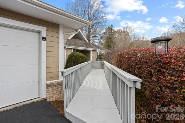 a view of balcony with furniture