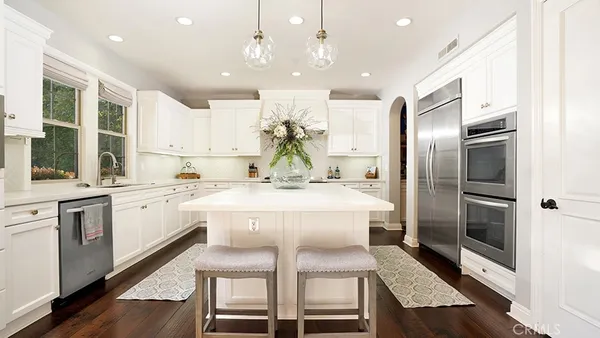 a living room with furniture fireplace and a flat screen tv