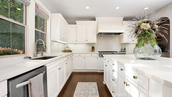 a work room with furniture and a window