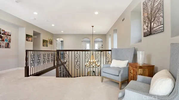 a kitchen with a stove a sink and a refrigerator